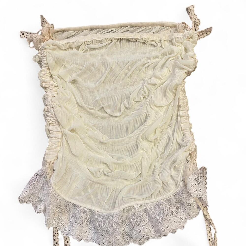 Adjustable white ruffled lace top